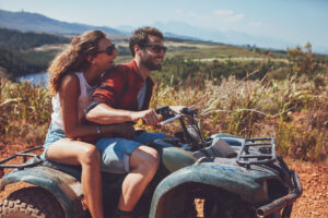 Couple outdoors on an ATV